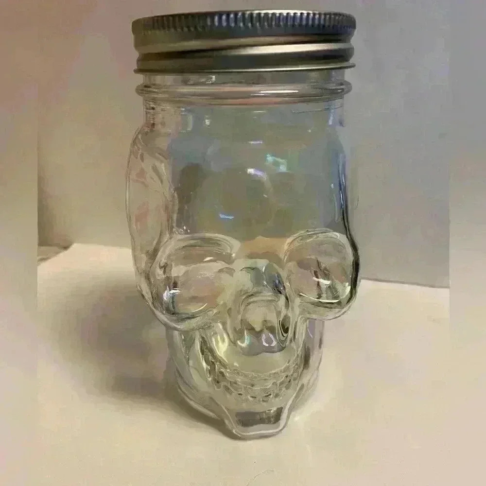 Skeleton Iridescent Skull Glass Jar can be used to put candy etc in for party